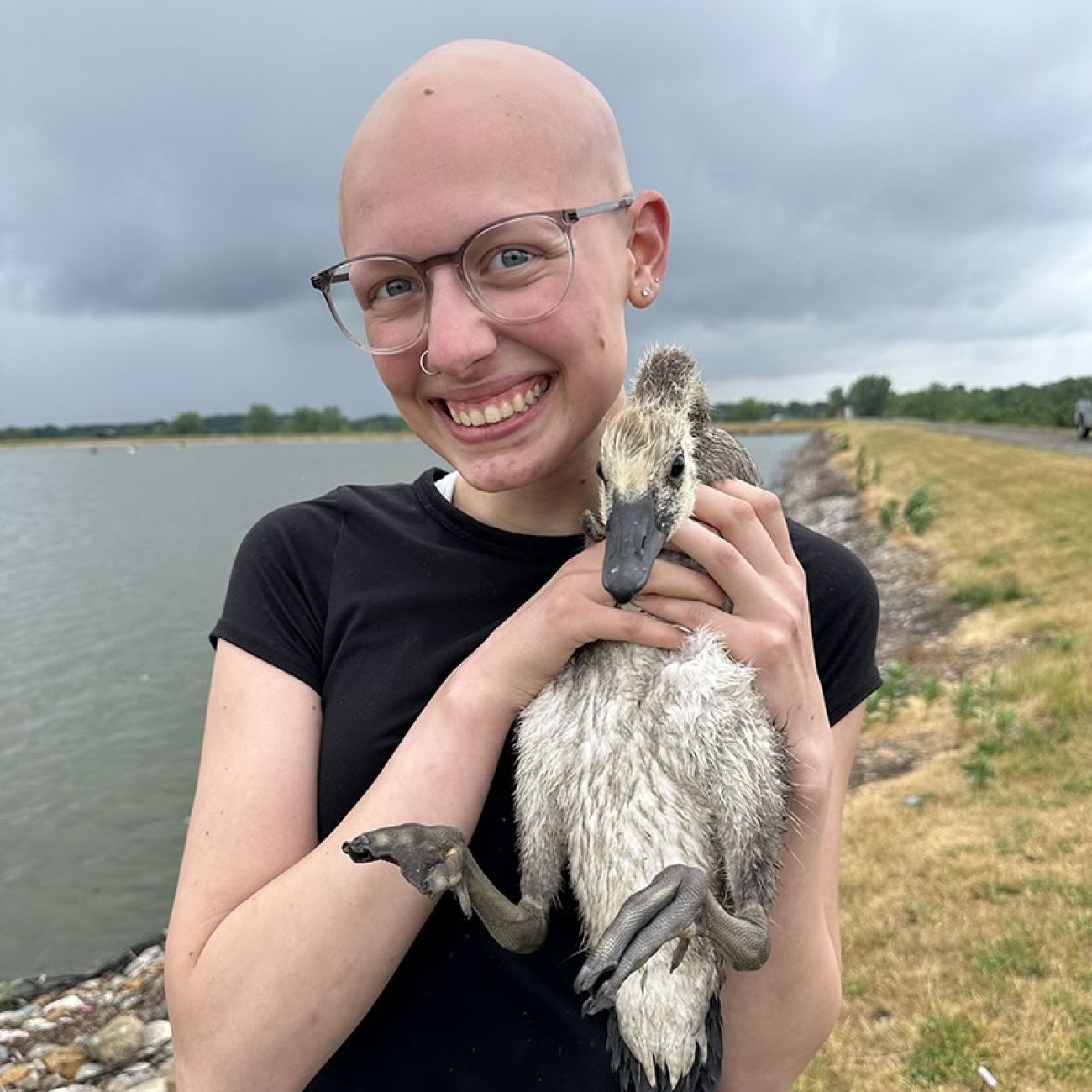 Ryann Jibson holding a bird