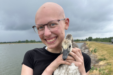 Ryann Jibson holding a bird