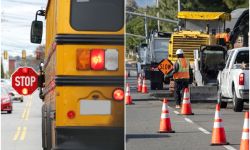 A school bus on the left and construction zone on the right