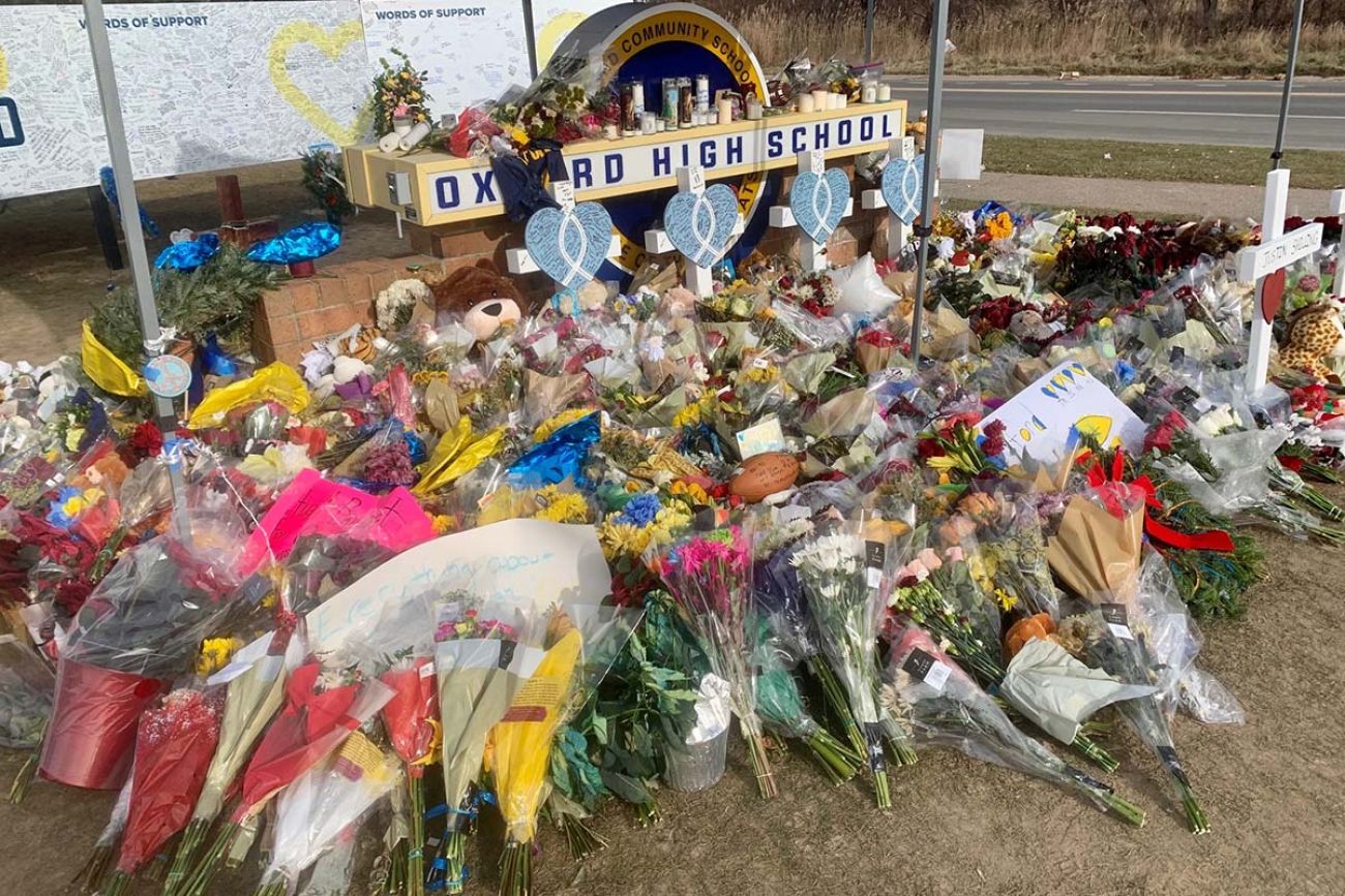 flowers surrounded by the Oxford High School sign