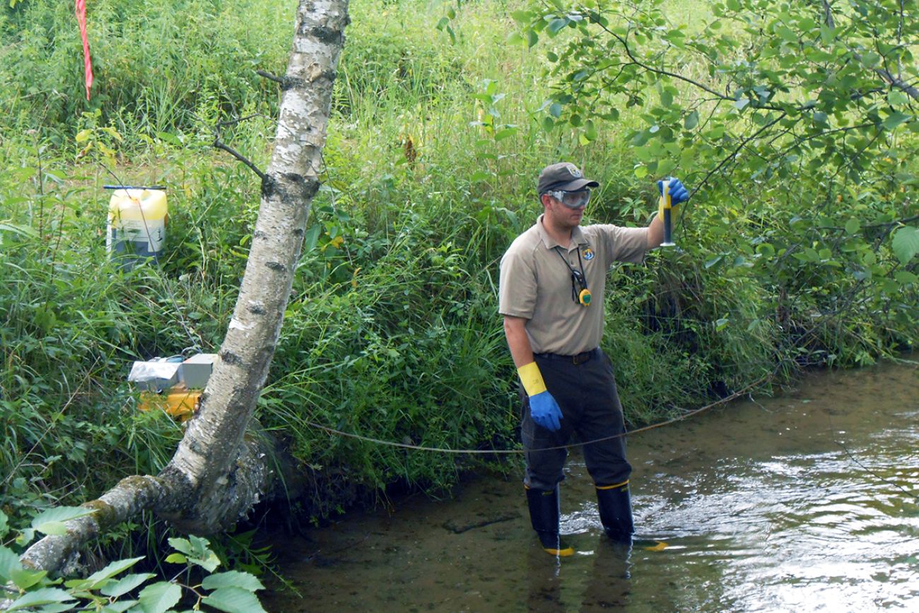 someone standing in river