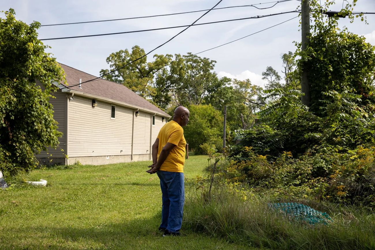 Larry Simmons standing outside