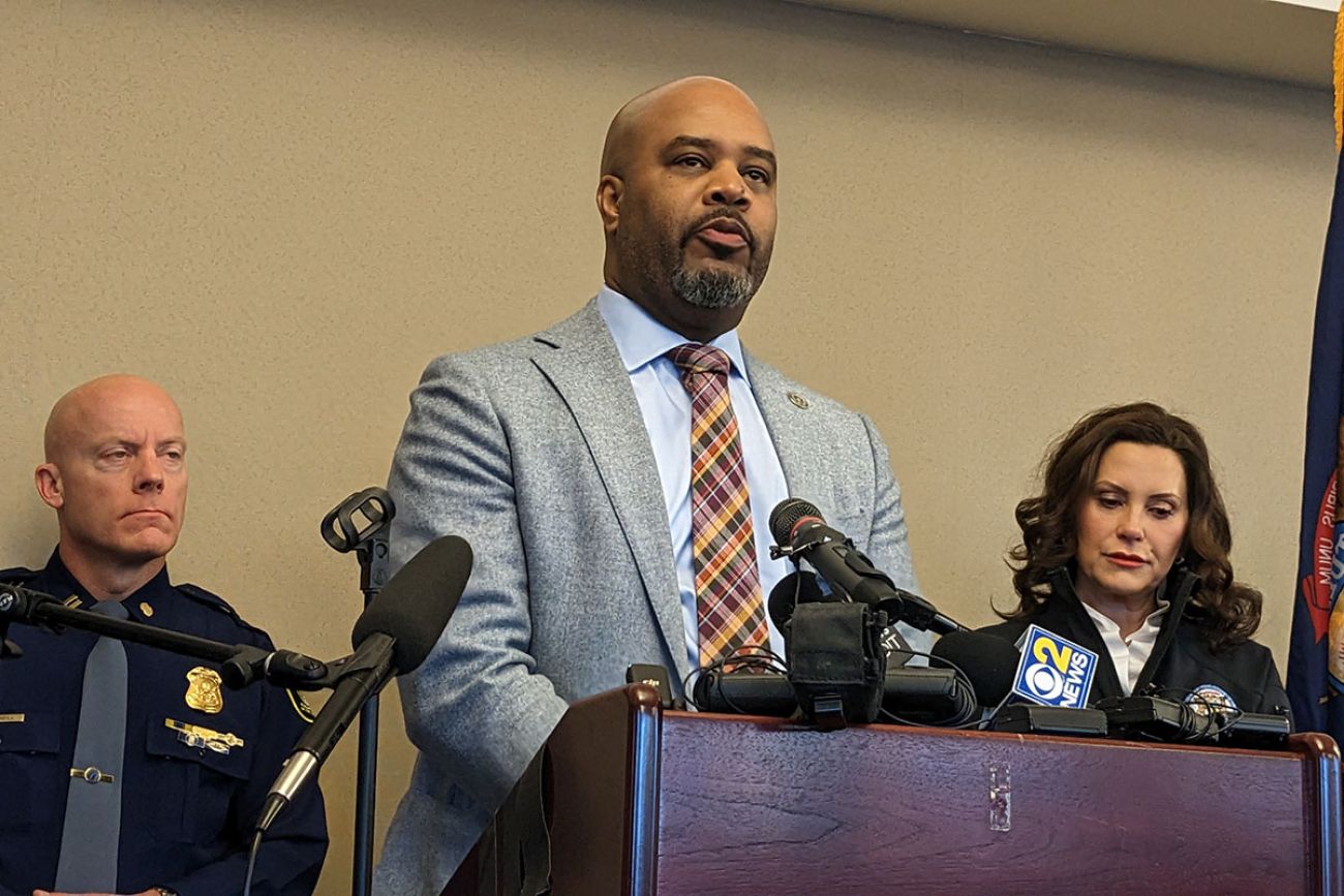 Marlon Lynch speaking into microphone