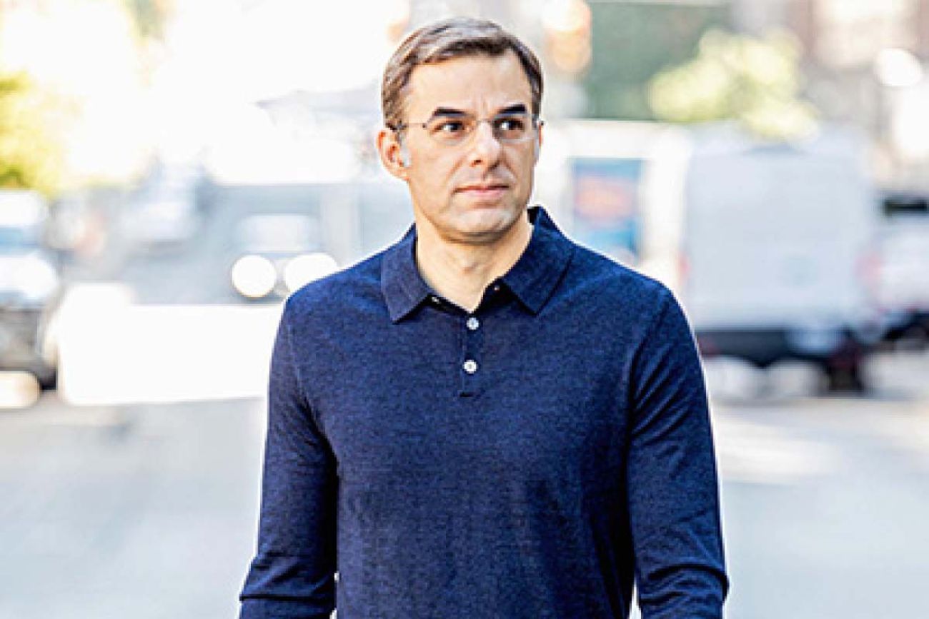 Justin Amash wearing a blue sweater