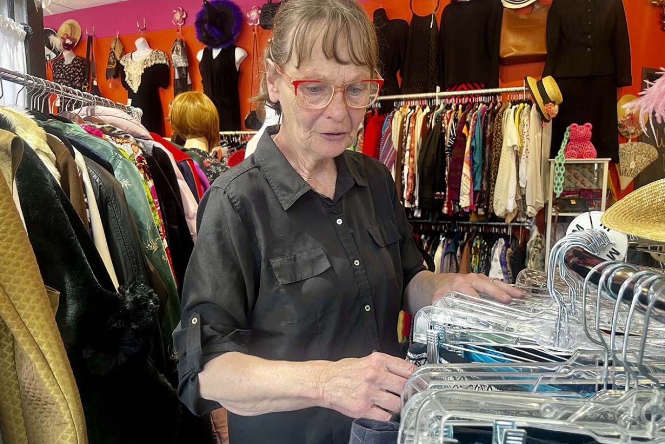 Diane Kubik looks at clothes in a store