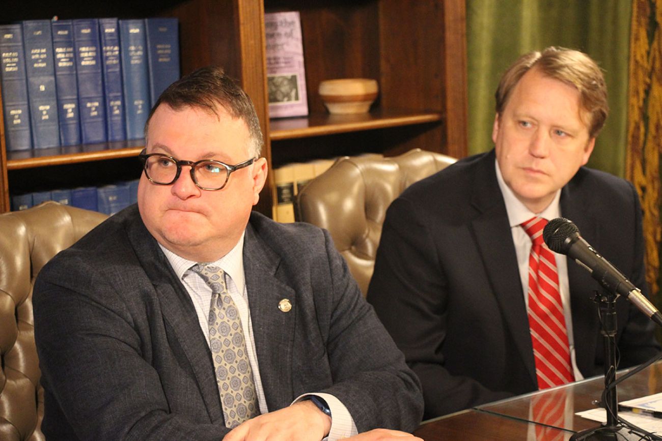 Michigan House Speaker Matt Hall sits at a table with House Minority Leader Matt Hall, R-Richland Township. 