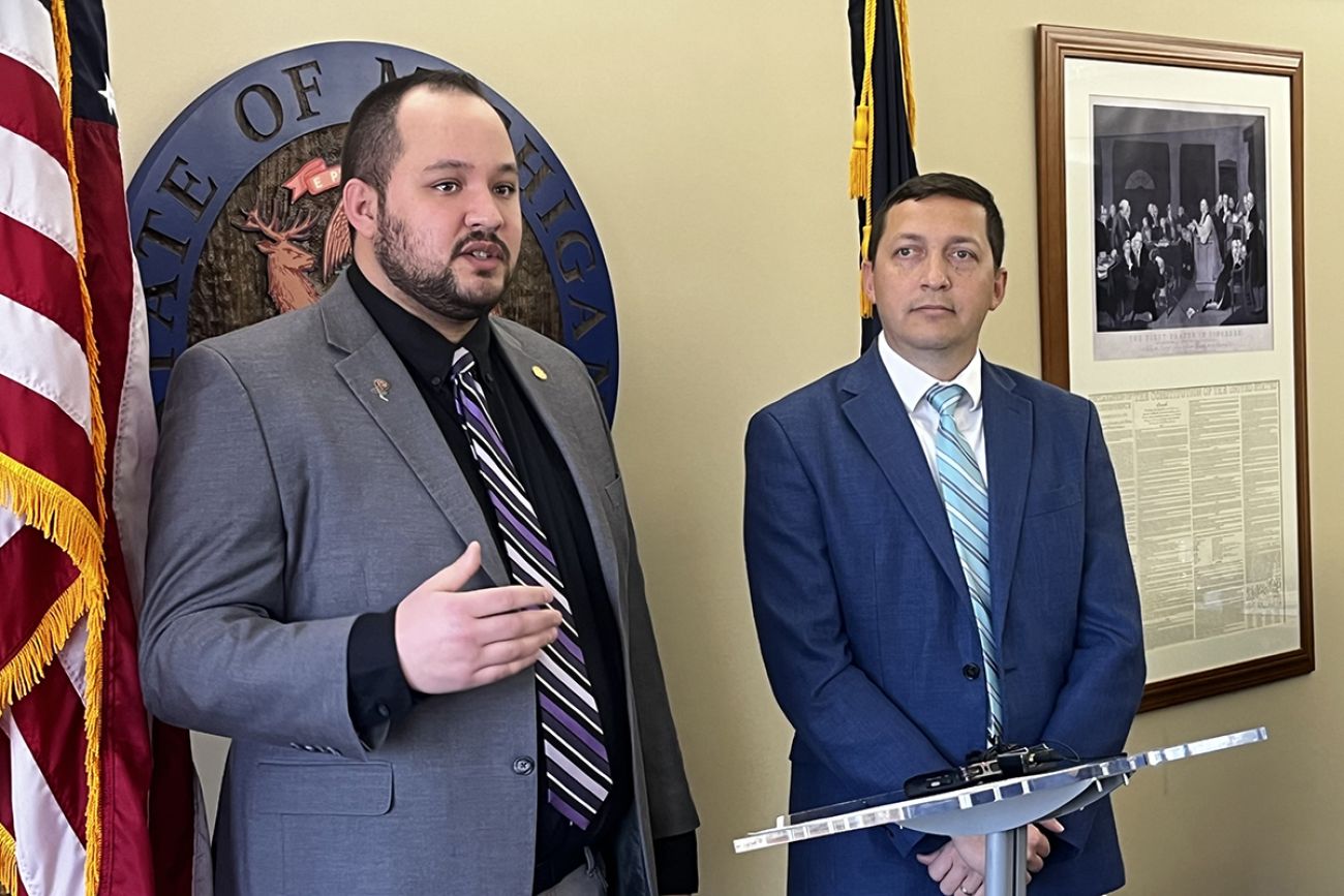 State Reps. Dylan Wegela, left, and Steve Carra, right, standing next to each other.