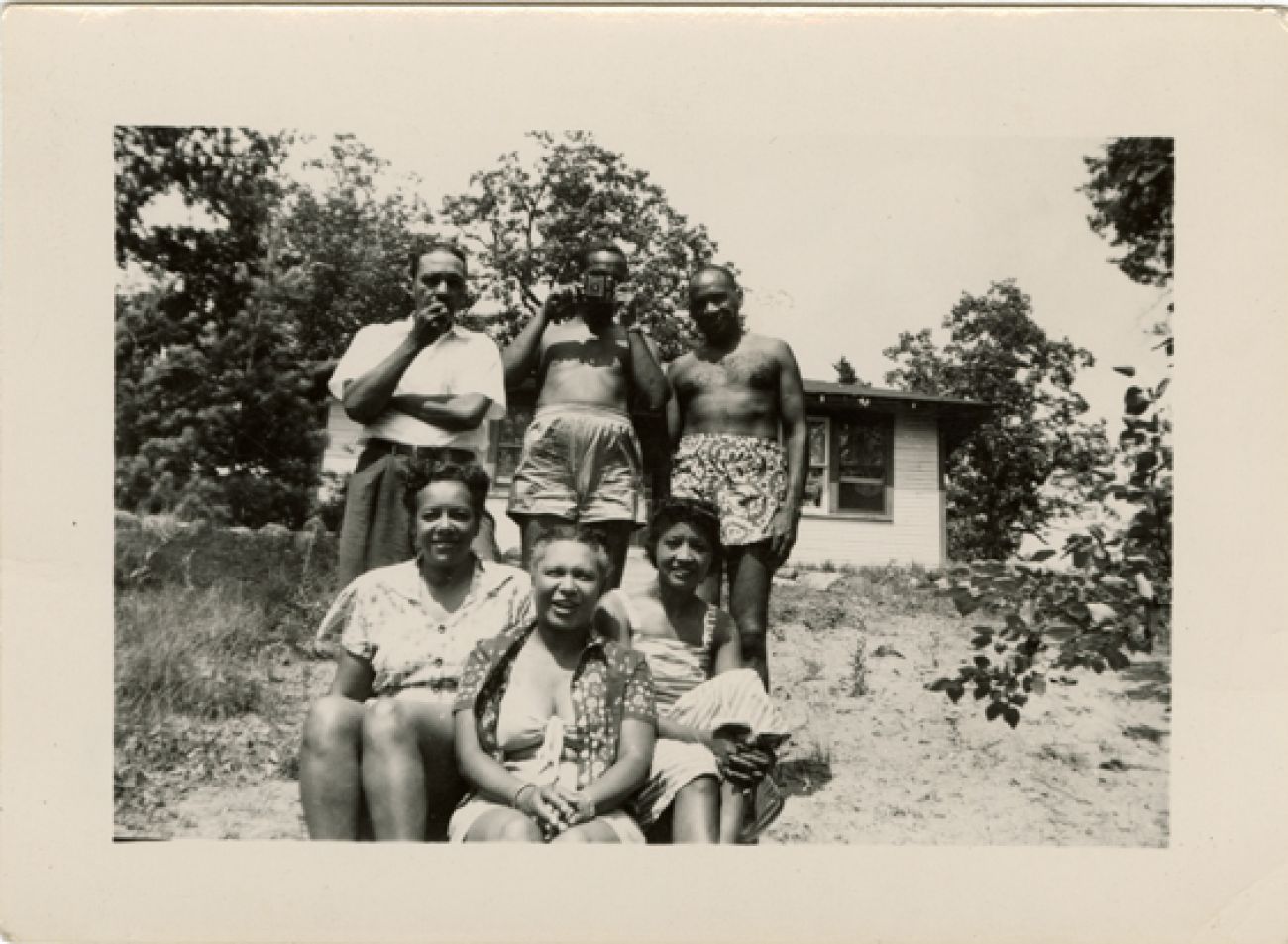 A black-and-white portrait of a family