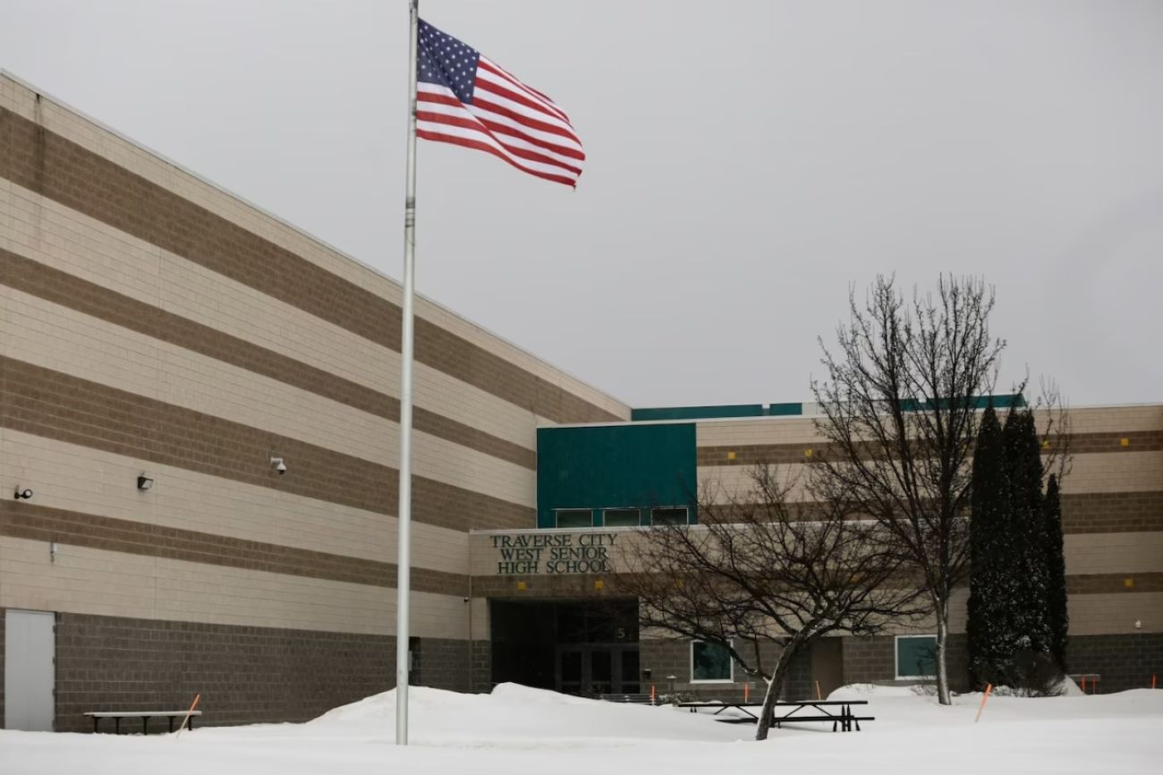 An exterior view of Traverse City West Senior High School on a snowy day.