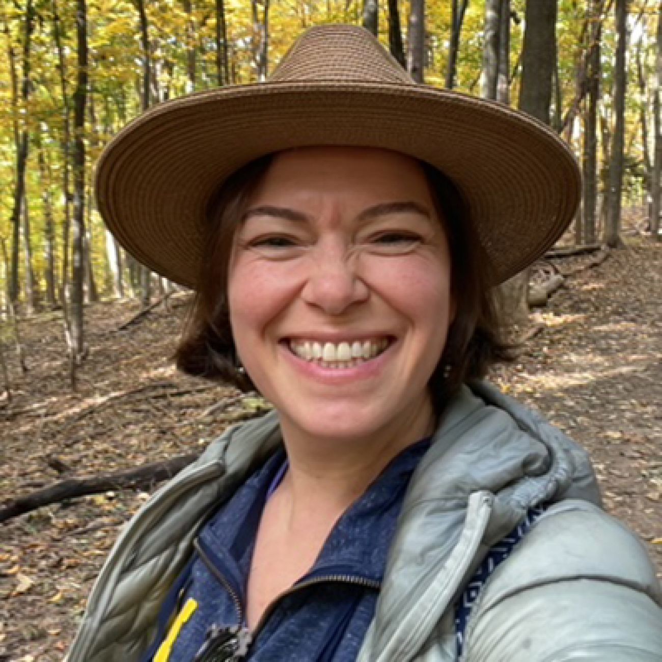 Leah Klass outside on a trail. 