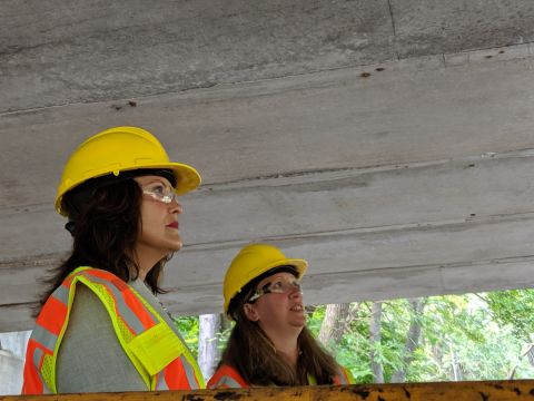 Michigan Gov. Gretchen Whitmer wearing a yellow hard hat