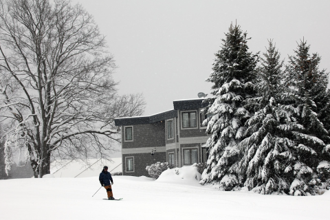 Skier on a snowy Crystal Mountain in Thompsonville, Michigan 