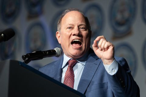 Detroit Mayor Mike Duggan speaking into a microphone 