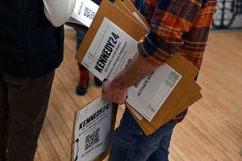 Man holds ballots