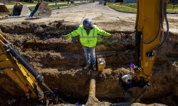 man in water main