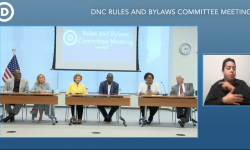 Debbie Stabenow, Debbie Dingell Garlan Gilchrist and Lavora Barnes on a table 