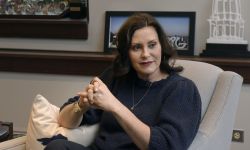 Gov. Gretchen Whitmer sitting