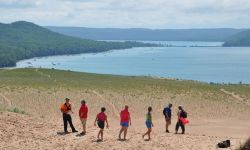 people walking on Sleeping Bear Dunes