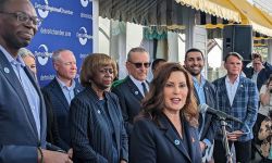 gov. gretchen whitmer talking into a microphone