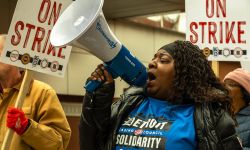 Yolanda Mcglone speaking into a megaphone