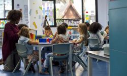 teacher with preschoolers in the classroom