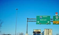  Semi trucks and cars in traffic jam on northbound I 75 heading into Detroit, Michigan.