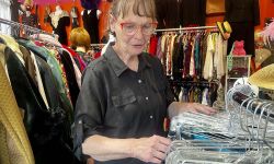 Diane Kubik looks at clothes in a store