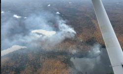 An aerial view of smoke from a wildfire in the Upper Peninsula