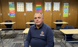 Bridgman Public Schools Superintendent Shane Peters sitting a classroom