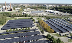 A screenshot of drone footage of solar-powered carports at Michigan State University. 